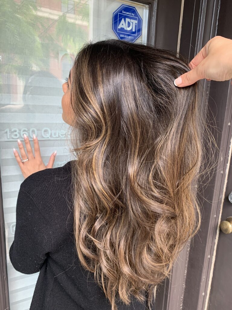 warm brunette balayage with natural dimension by Tatiana Hair, Toronto.